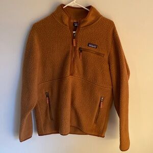 Patagonia fleece; color: rusty orange